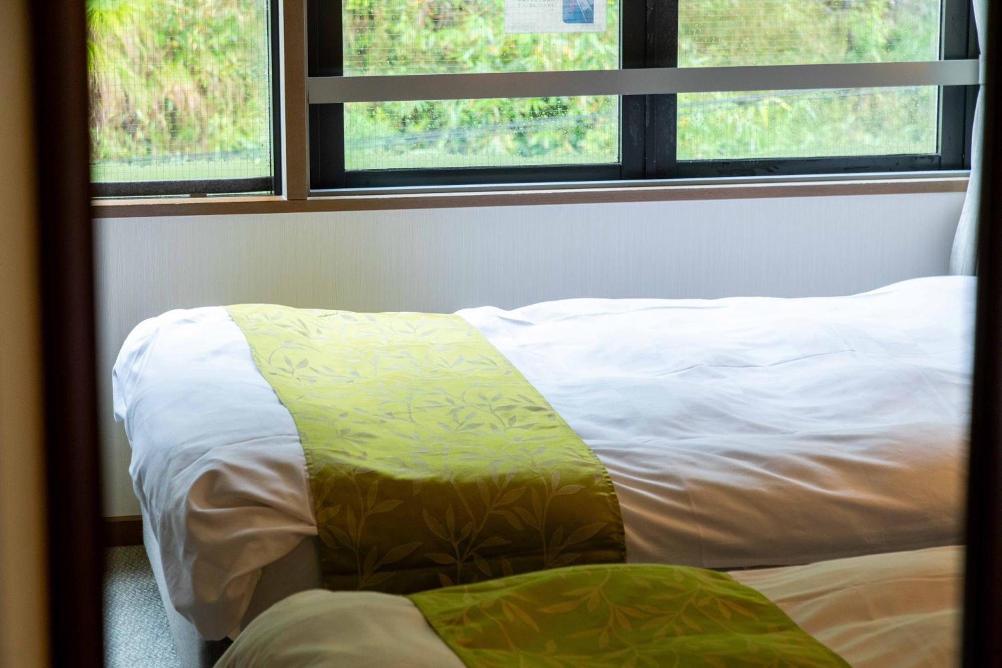 Suizansou Hotel Toyooka  Bagian luar foto
